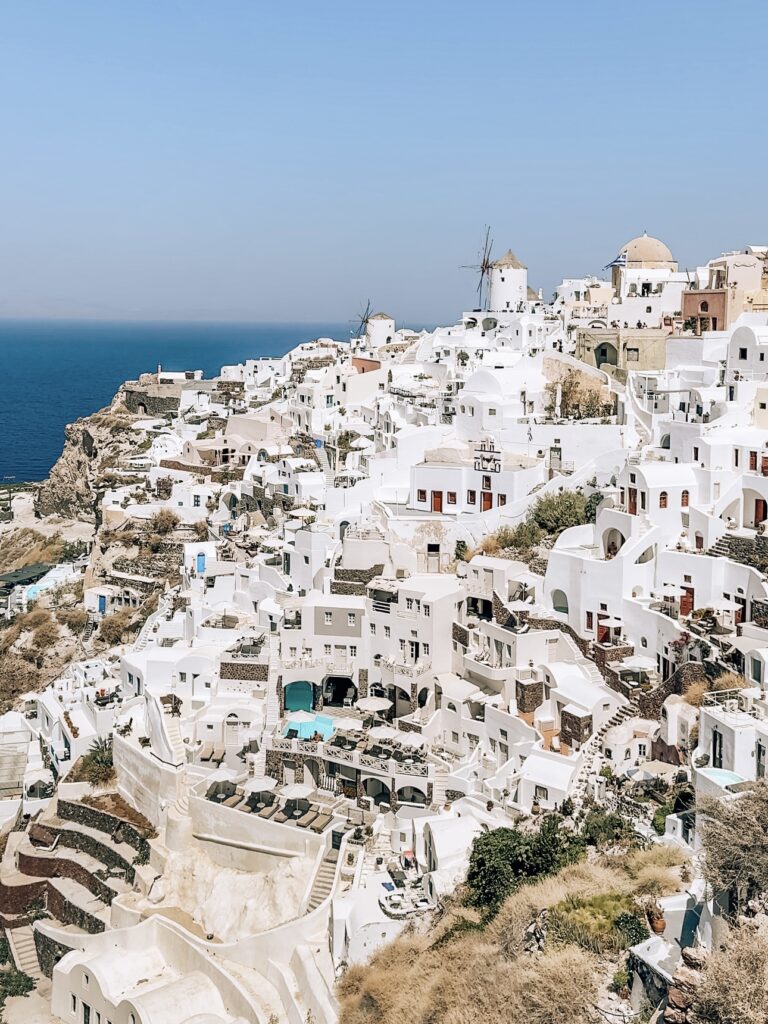 Ruins of Oia Castle overlooking the caldera, a popular spot for sunset views in Santorini