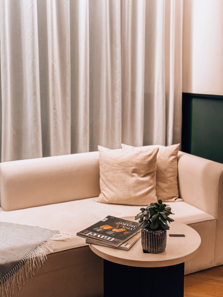 cozy room of Almanac X Alcron Prague Hotel featuring local artwork in a hotel review of Almanac X Alcron, one of best hotels to stay in Prague