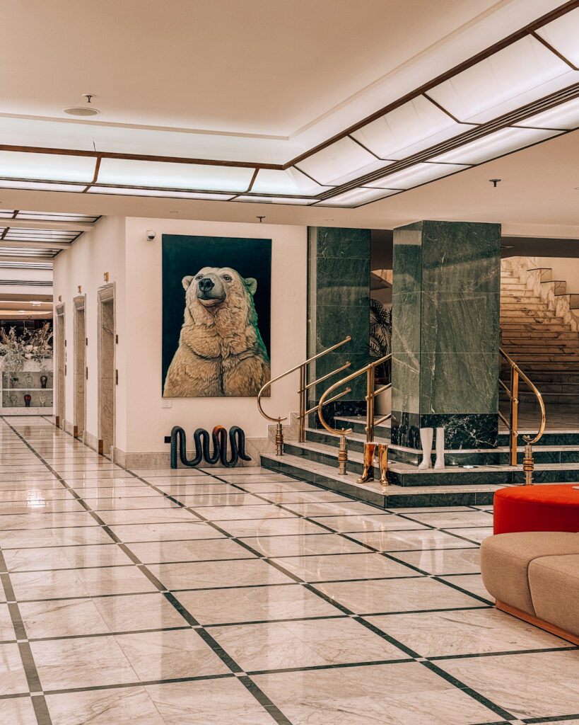 cozy lobby of Almanac X Alcron Prague Hotel featuring local artwork in a hotel review of Almanac X Alcron, one of best hotels to stay in Prague 