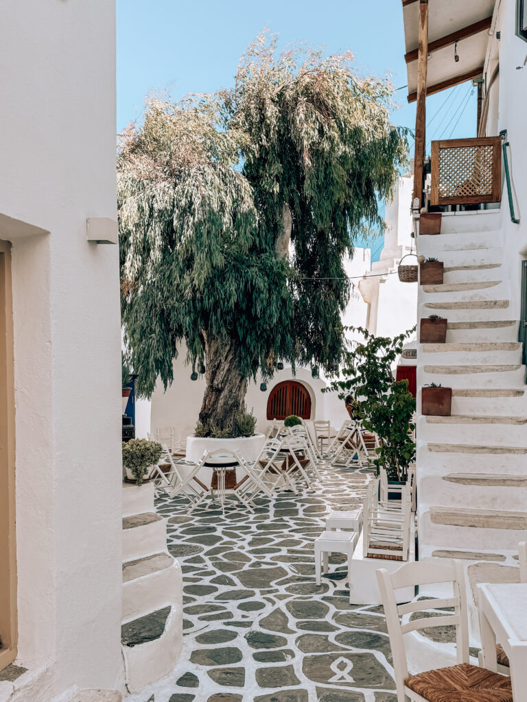 Streets of Naoussa with bougainvillea in Paros, Greece