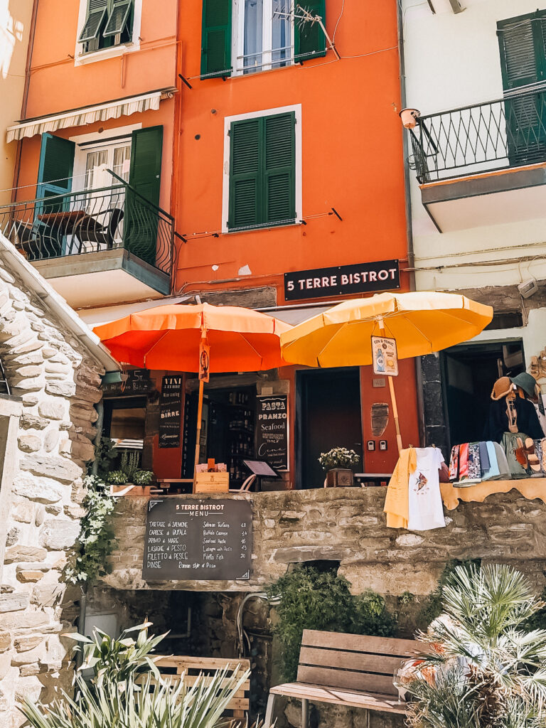 A cute bistrot in Cinque Terre Italy carved into a rock