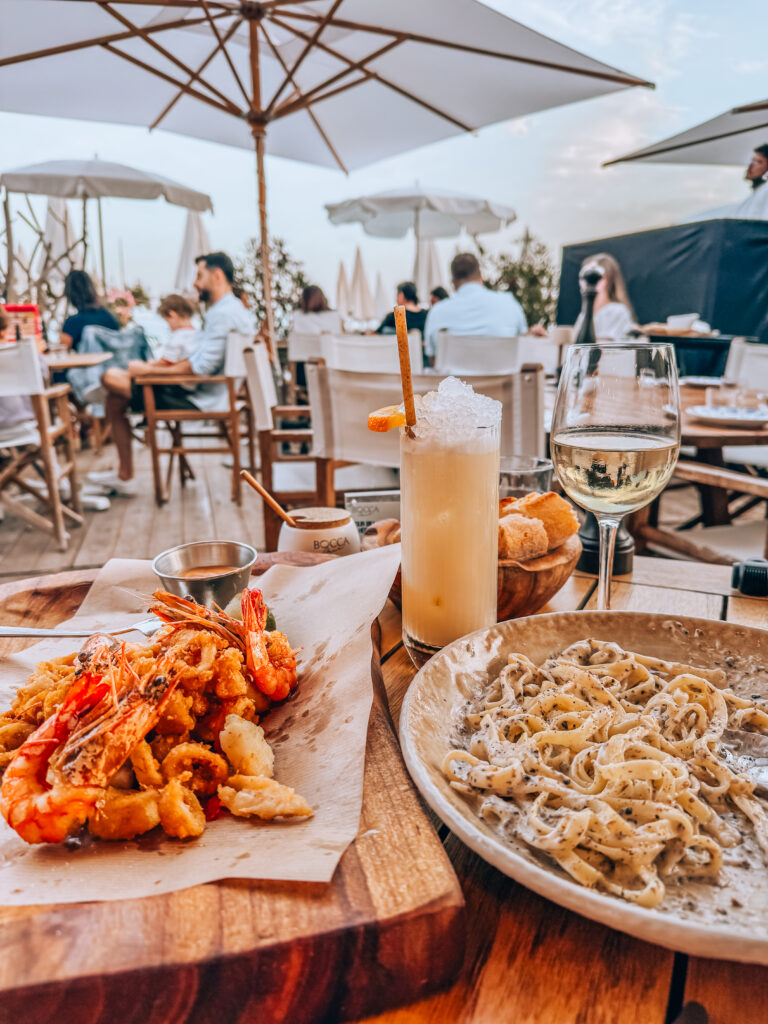dining at a beach club in Nice, france
