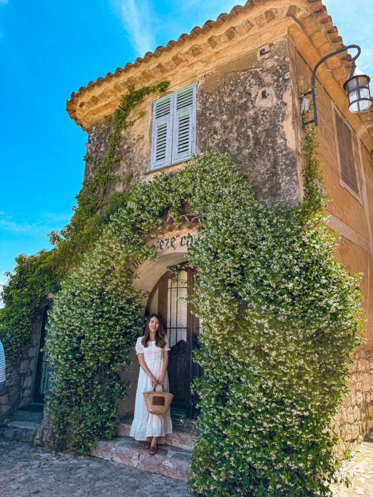 stone building surrounded by ivy in Eze Village France