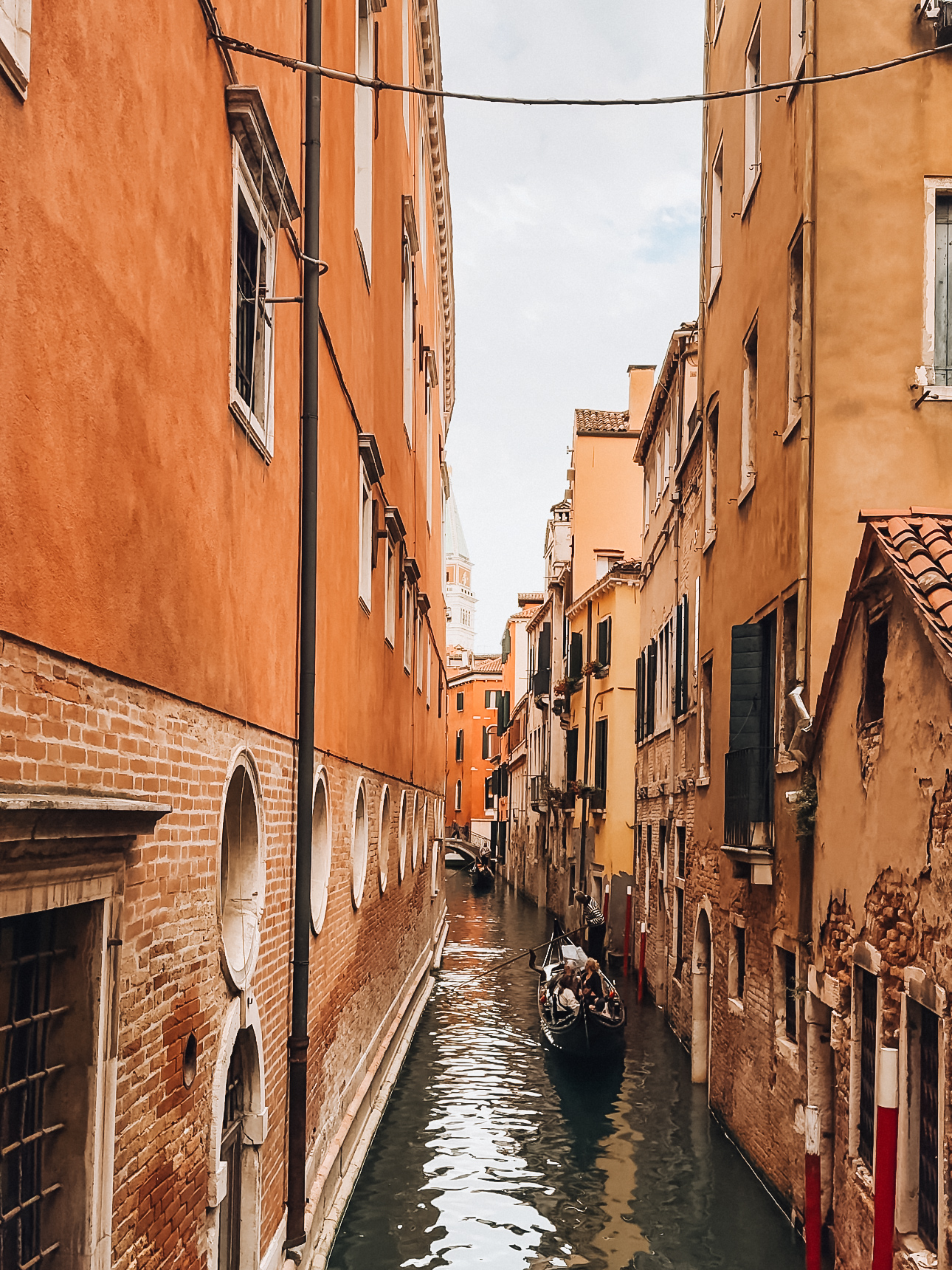 A gondola in the narrow canals of Venice
