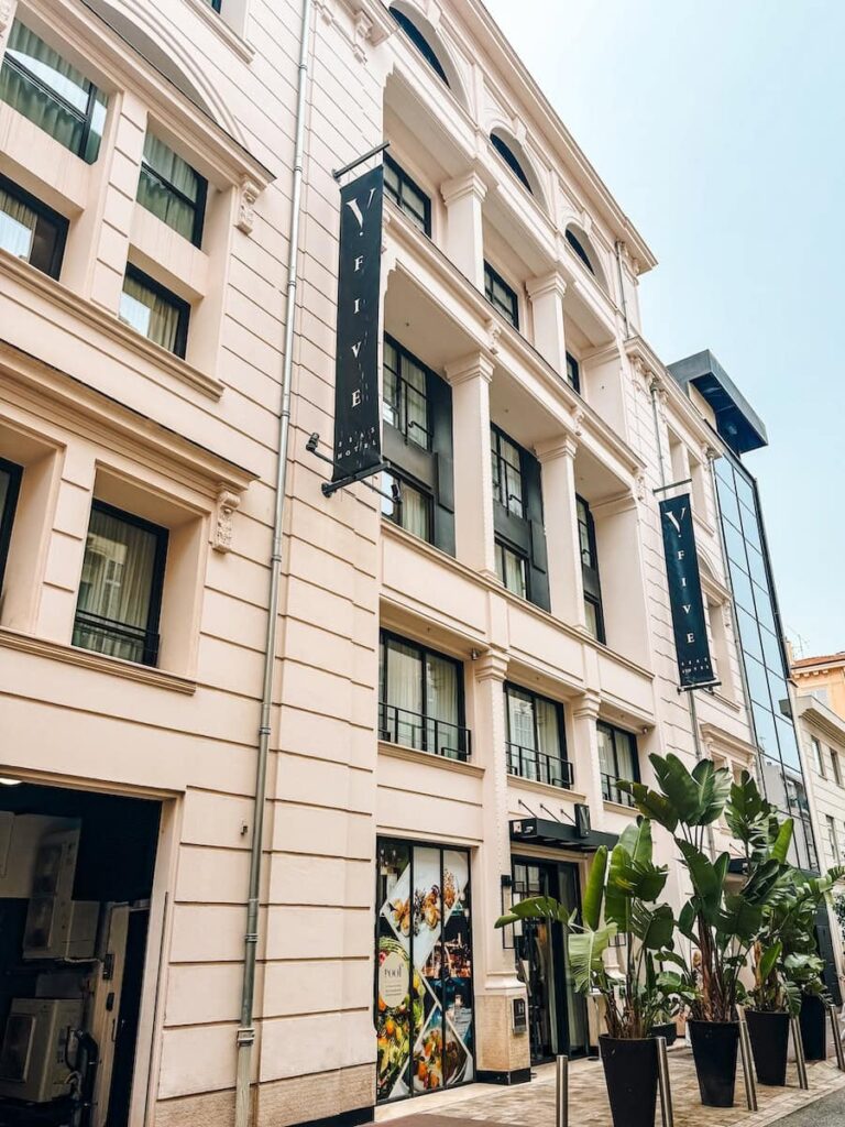 Exterior of Five Seas Hotel Cannes with elegant cream facade and modern signage in central Cannes