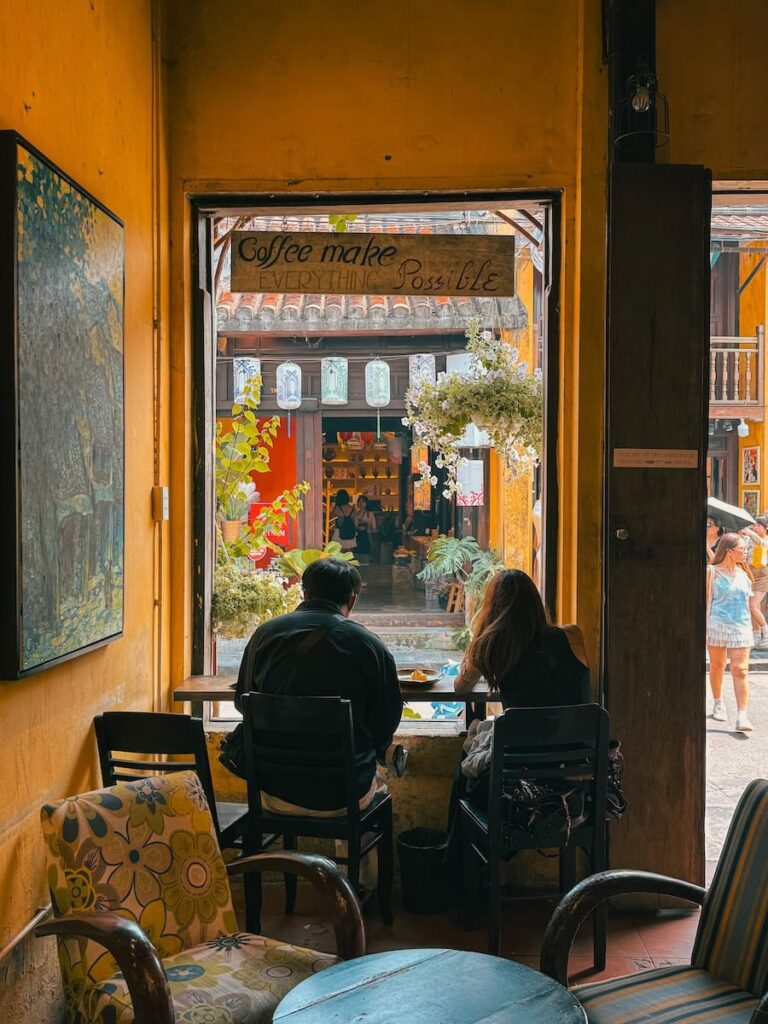 Cozy interior seating area inside Faifo Coffee in Hoi An Ancient Town