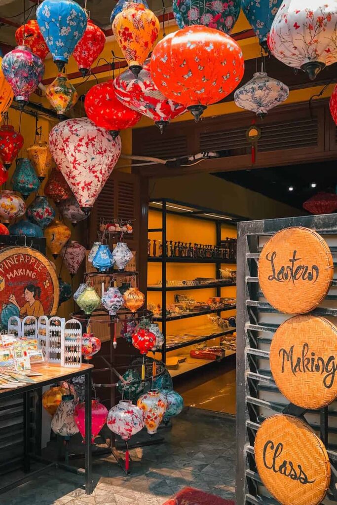 Lantern making workshop storefront in Hoi An filled with colorful handmade lanterns