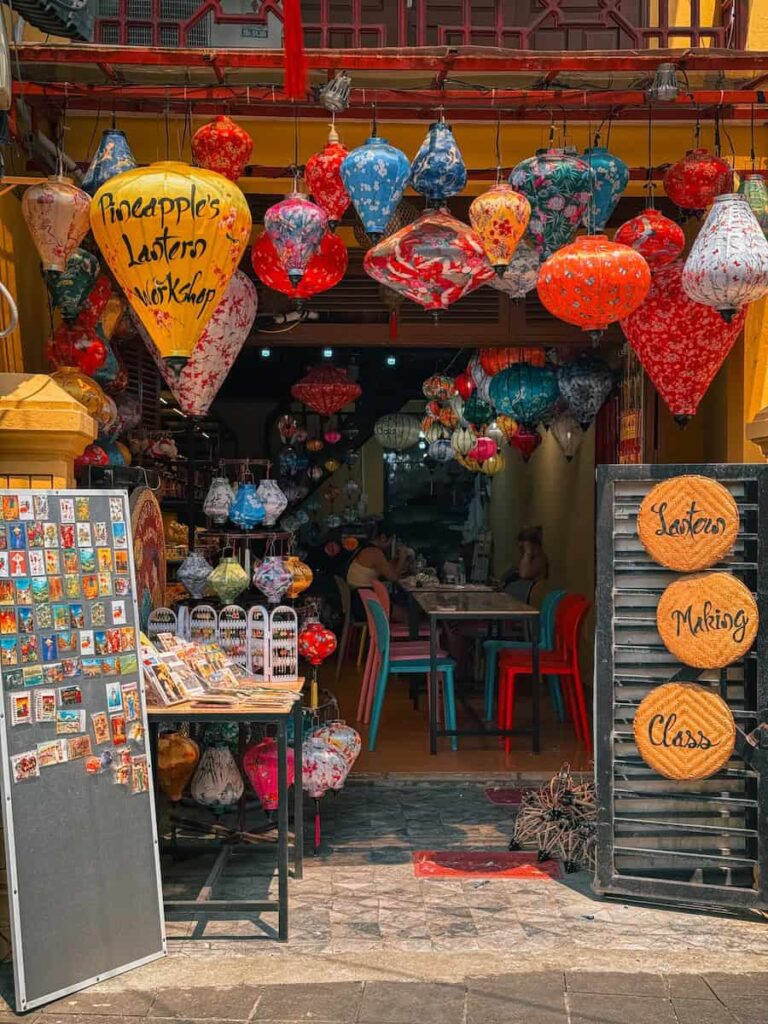 Lantern making workshop storefront in Hoi An filled with colorful handmade lanterns
