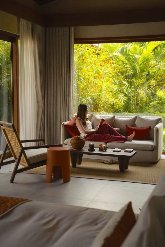 Cozy villa interior at Namia River Retreat surrounded by tropical greenery in Hoi An