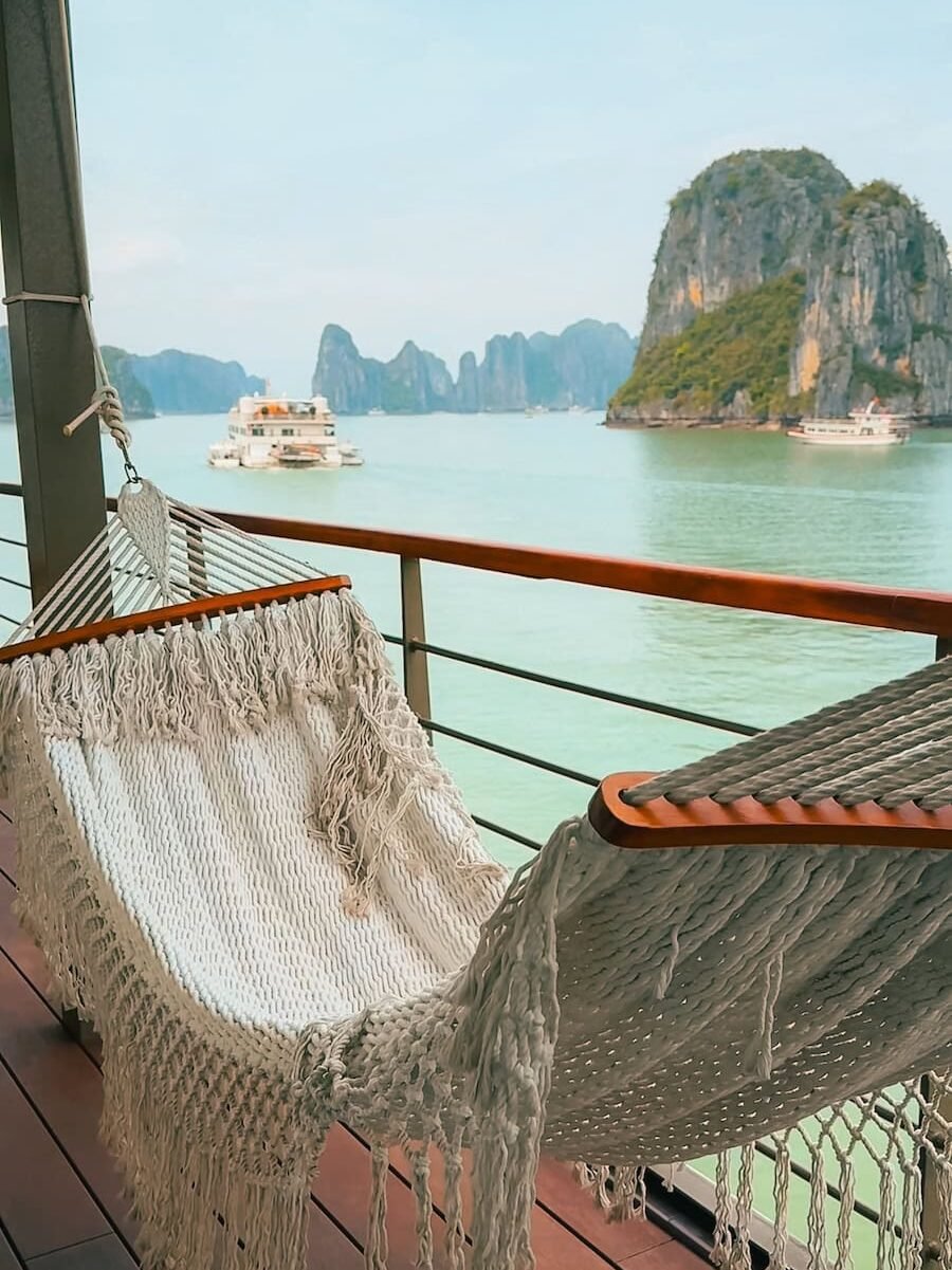 Hammock on the deck of Bhaya Soul overlooking the karsts of Lan Ha Bay