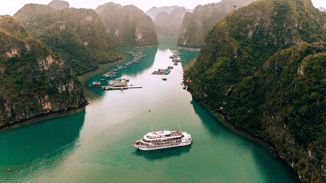 Bhaya Soul cruise ship anchored among the limestone islands of Ha Long Bay. Ha long bay is a must on a vietnam itinerary